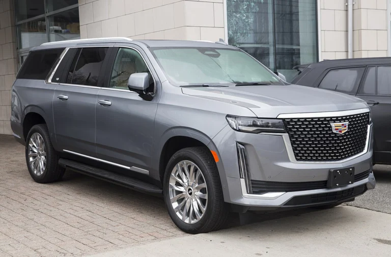 Gray Cadillac Escalade ESV, front three-quarter view