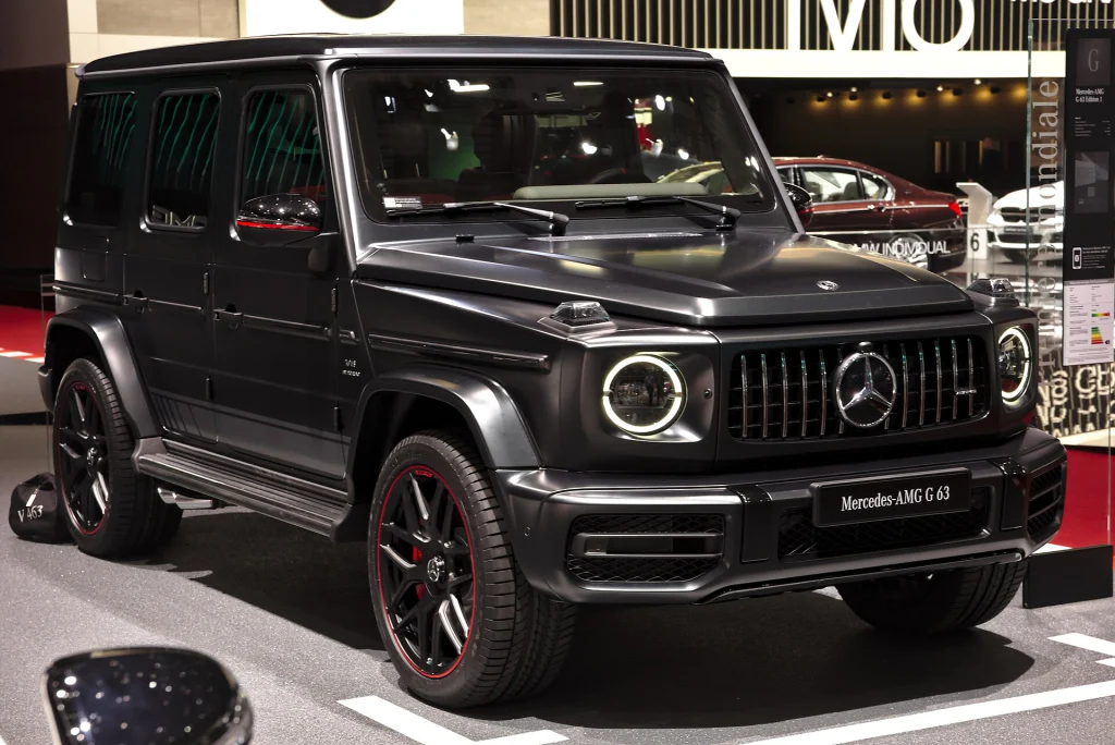 Dark Mercedes-AMG G 63 displayed at a motor show