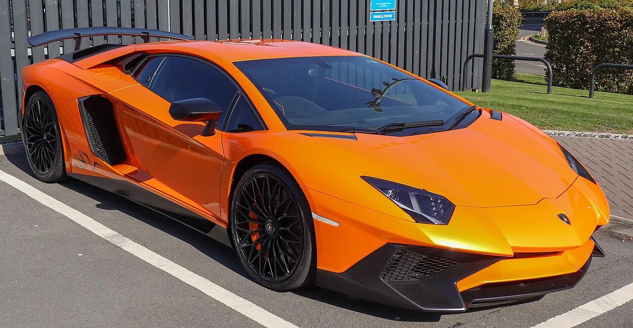 Orange Lamborghini Aventador SV coupe, front three-quarter view