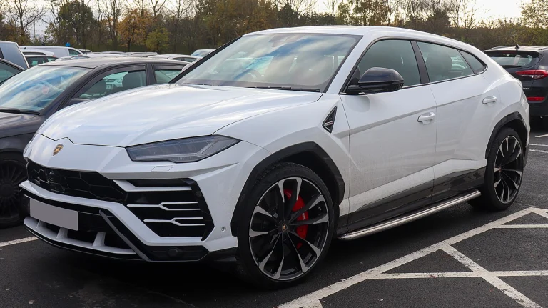 White Lamborghini Urus, front three-quarter view