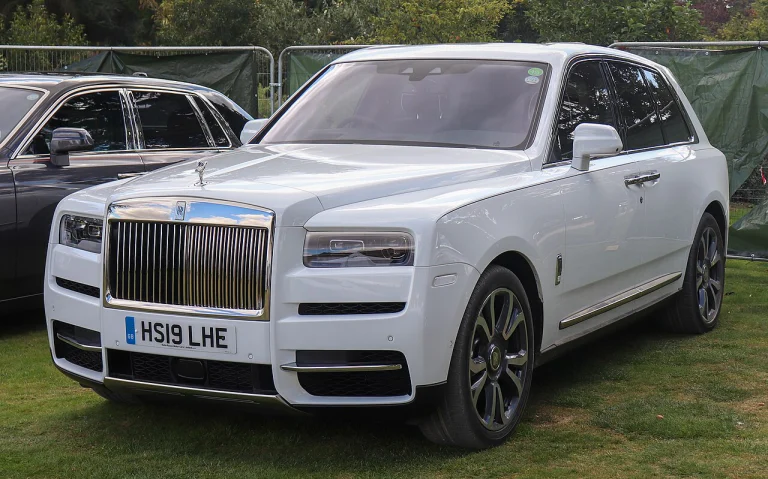 White Rolls-Royce Cullinan SUV, front three-quarter view