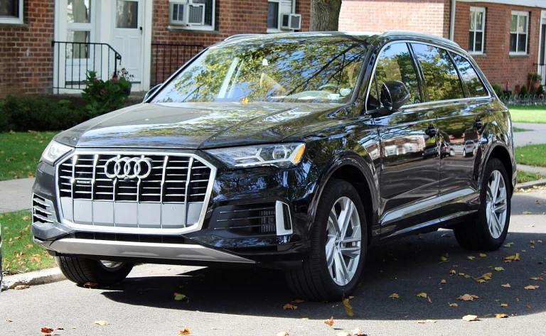 Black Audi Q7 SUV parked on a street