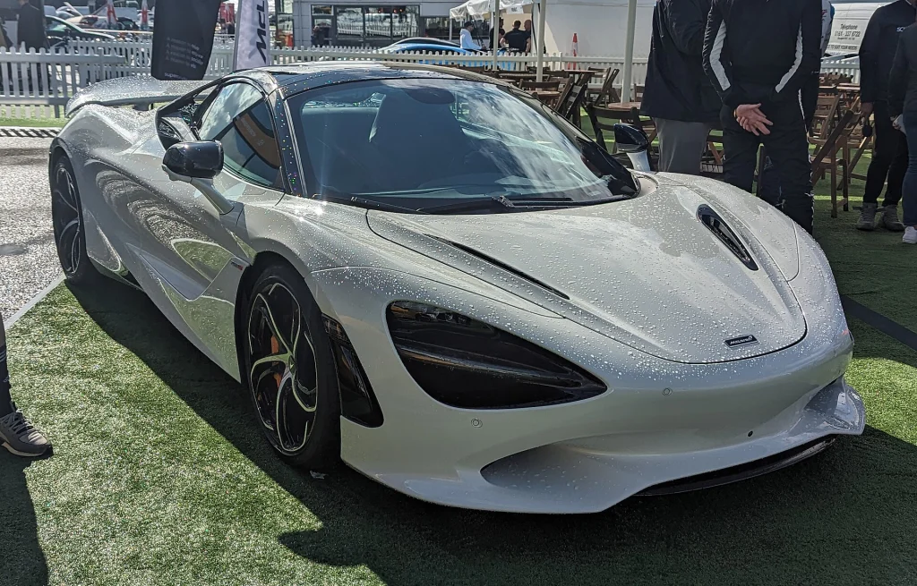 Silver McLaren 750S displayed on grass