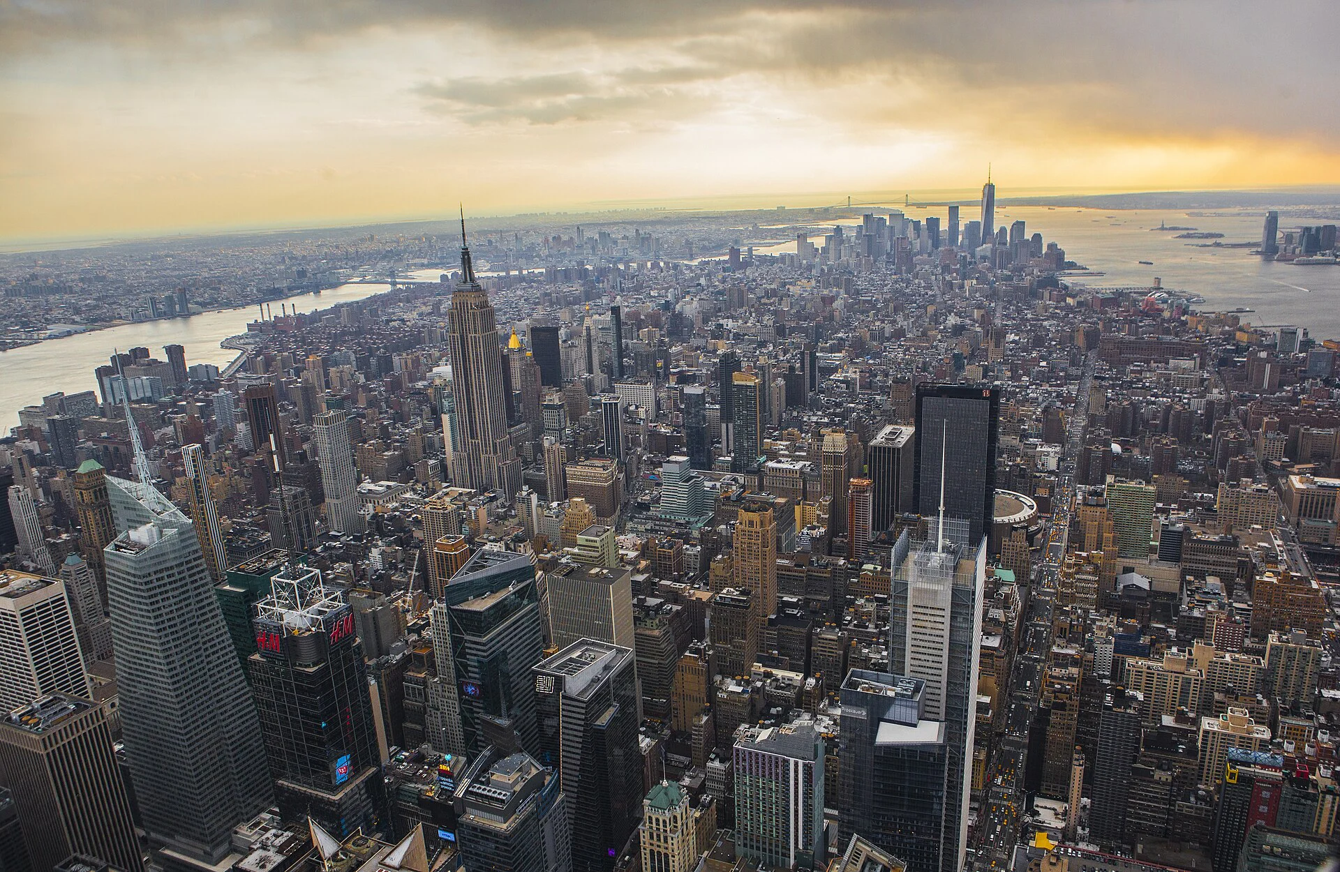 Aerial view of Manhattan and its surrounding rivers at sunset