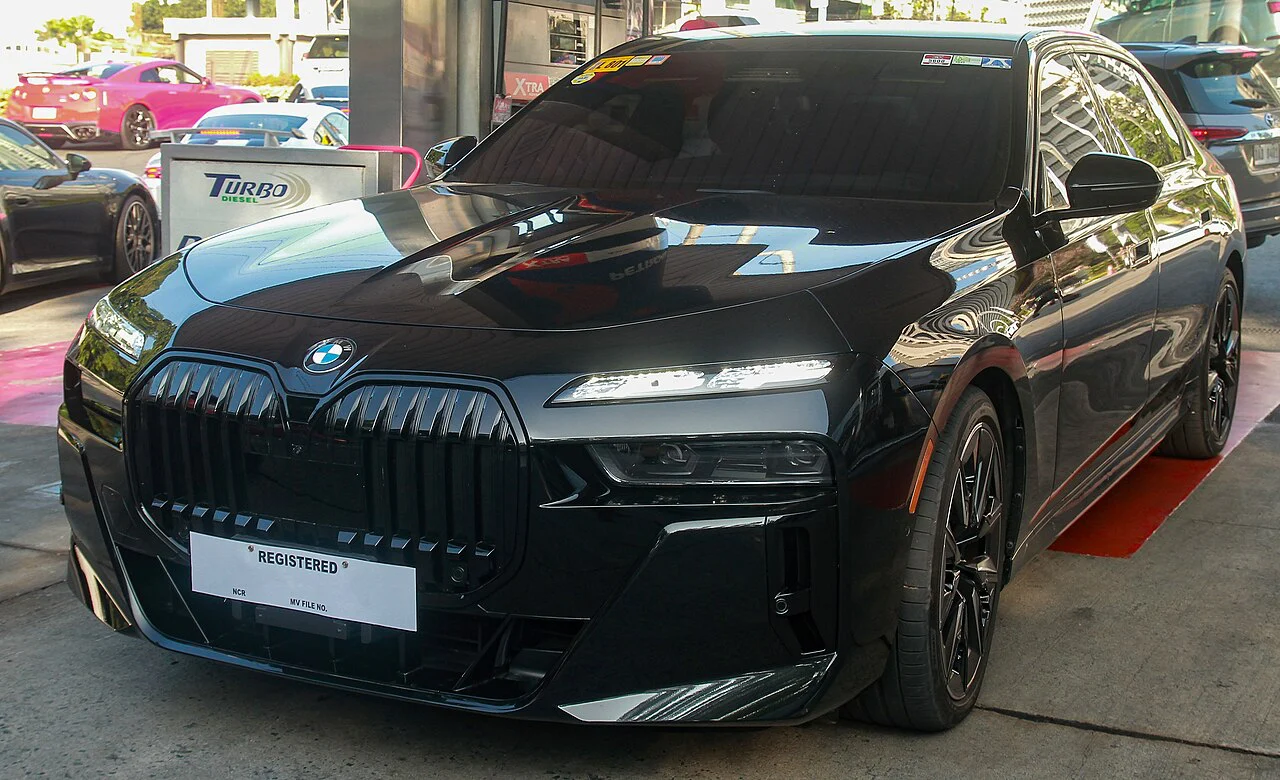 Black BMW 760i sedan with M Sport exterior details