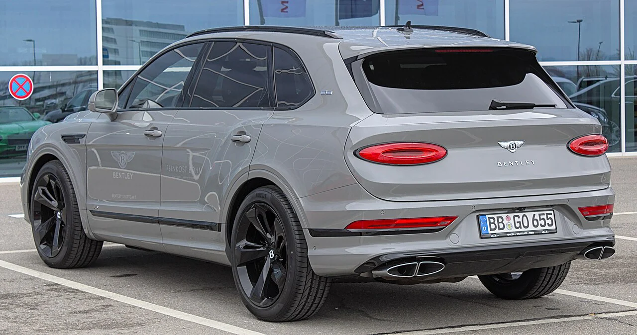 Rear three-quarter view of a gray Bentley Bentayga V8