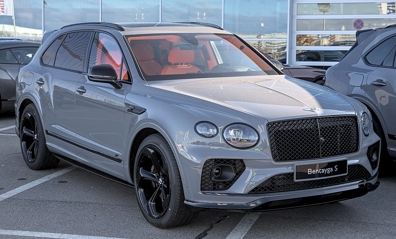 Silver Bentley Bentayga S with a red interior