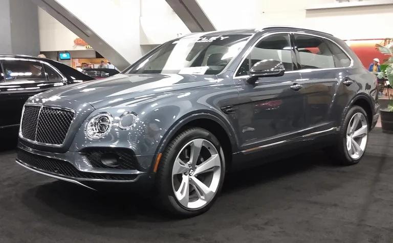 Gray Bentley Bentayga W12 SUV in a showroom