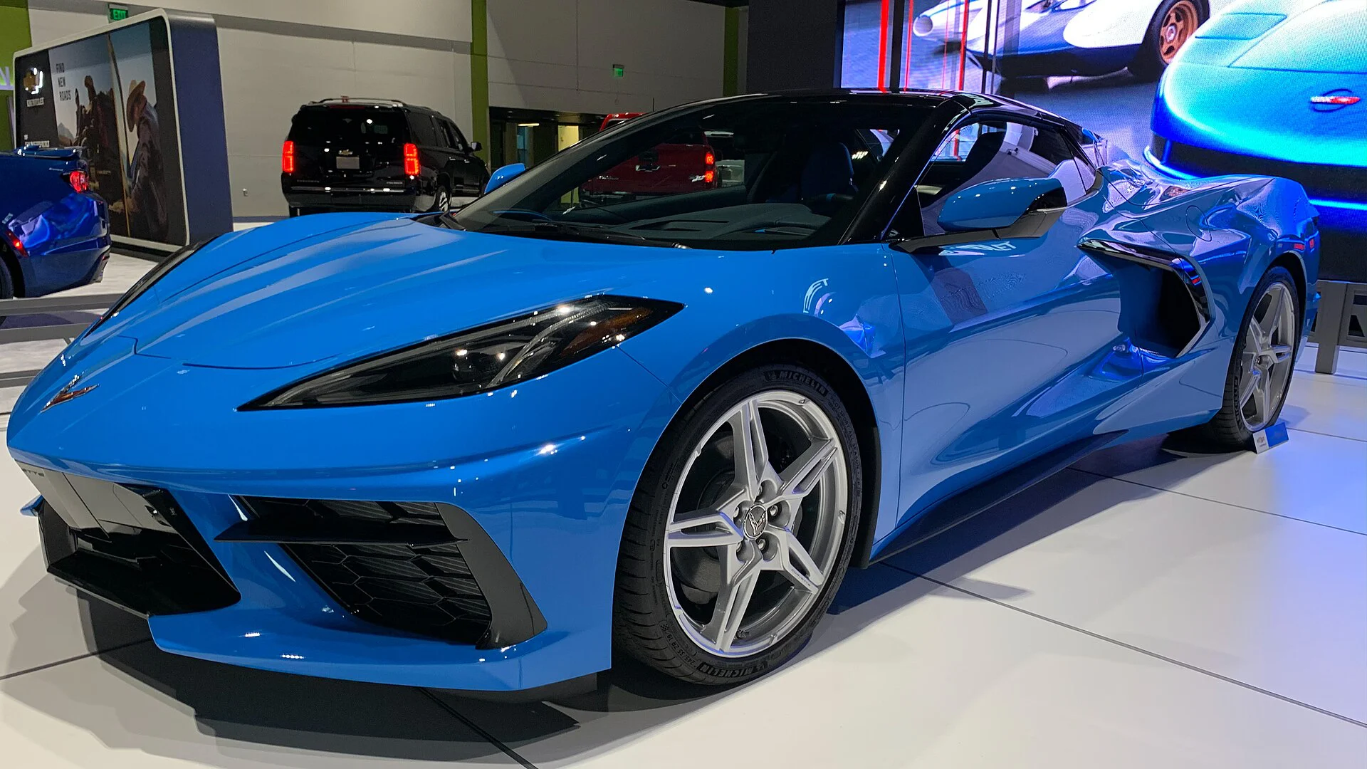 Blue Chevrolet Corvette C8 Stingray on a showroom display