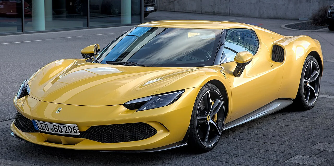 Yellow Ferrari 296 GTB, front three-quarter view