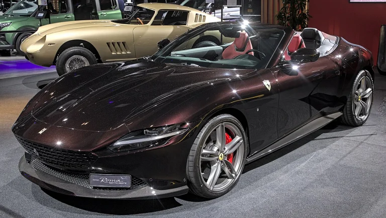 Ferrari Roma Spider with its roof lowered on a motor-show display