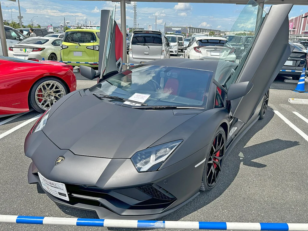 Gray Lamborghini Aventador S with both doors raised