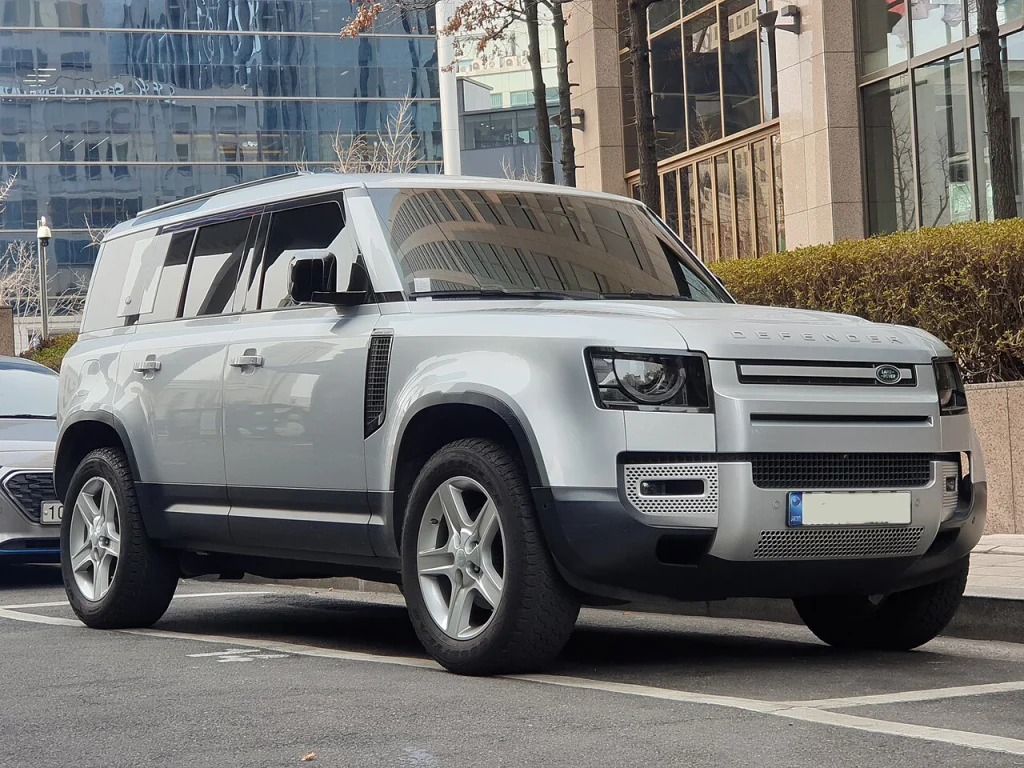Silver Land Rover Defender 110, front three-quarter view