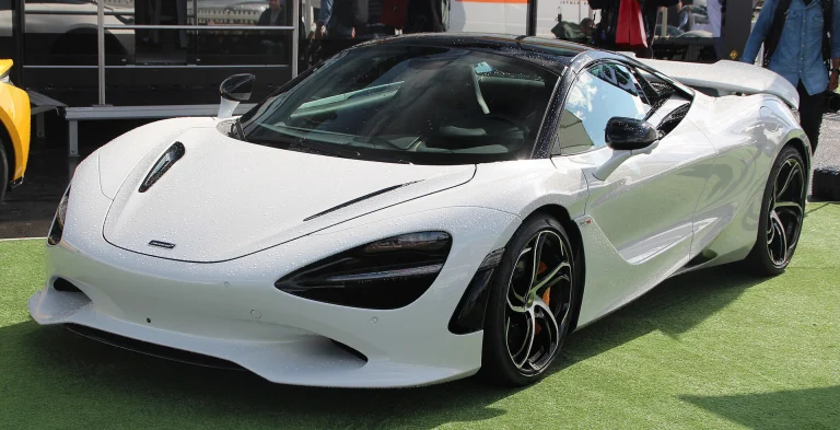 White McLaren 750S coupe displayed on grass