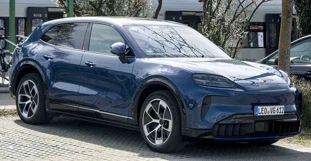 Blue Porsche Cayenne Electric, front three-quarter view