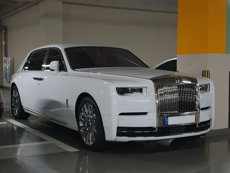 White Rolls-Royce Phantom VIII extended-wheelbase sedan in a garage
